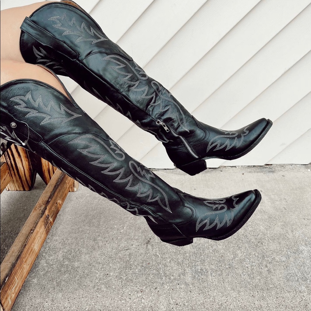 Brand new over the knee black cowboy boots.